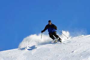 skier on steep slope