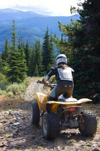 Quad rider on mountain trail near Donner summit, CA